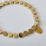 HASHIBAMI 【HB2102277 HASHIBAMI 天然石 ブレスレット ※平丸型6mm】 ゴールド