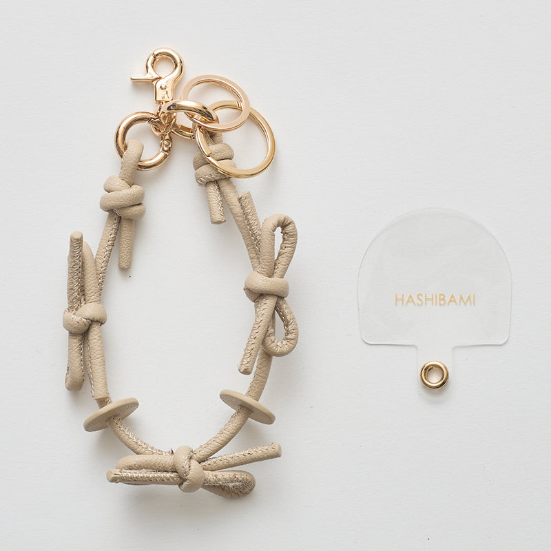 ◆CORRECT限定◆HASHIBAMI 【Ha-2410-324 レザーリボン スマホハンドストラップ】ベージュ